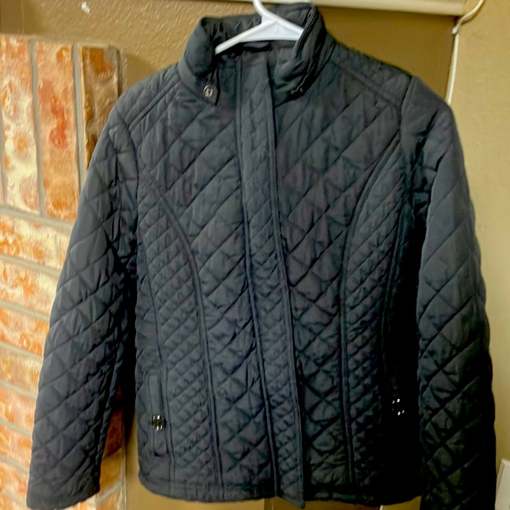I man selling an almost brand new light weight coat/jacket waterproof